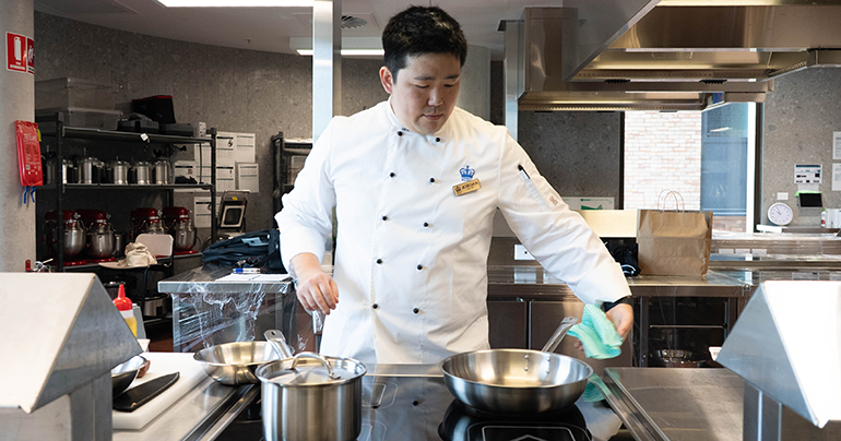 Chef Jordan working in CIT kitchen